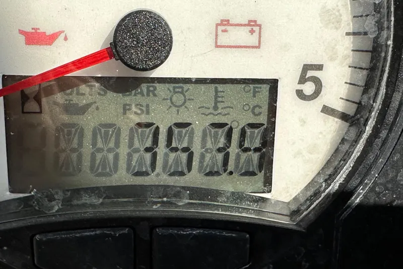 Shamrock Yacht Photos Pics Close-up of a Beneteau Oceanis 40 gauge panel, displaying oil and battery indicators.