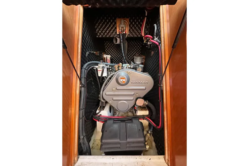 Shamrock Yacht Photos Pics Engine compartment of a 2011 Beneteau Oceanis 40 sailboat, featuring a Yanmar engine.