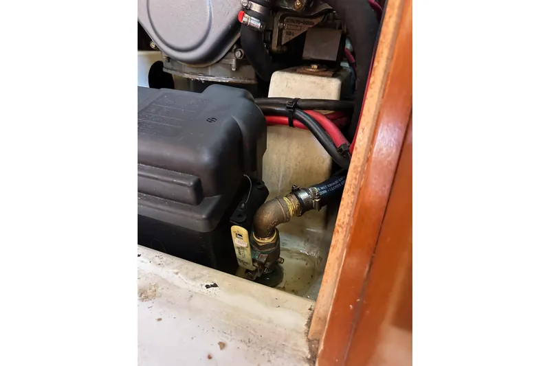 Shamrock Yacht Photos Pics Engine compartment of a 2011 Beneteau Oceanis 40 sailboat, showing mechanical components.