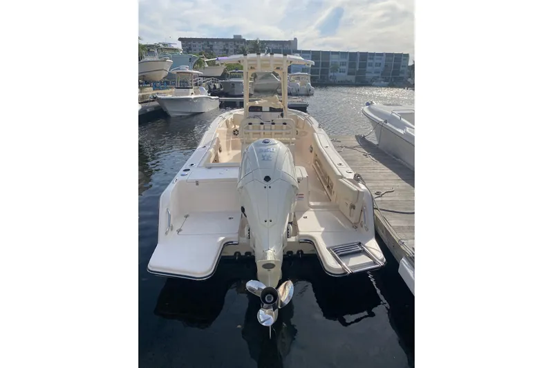  Yacht Photos Pics 2025 Grady-White Fisherman 236 boat docked at marina, rear view.