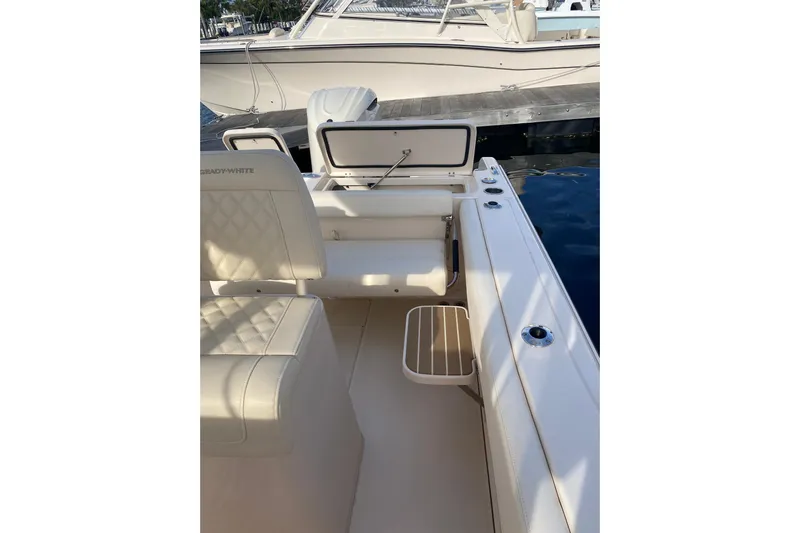  Yacht Photos Pics 2025 Grady-White Fisherman 236 boat interior with seating and rod holders.