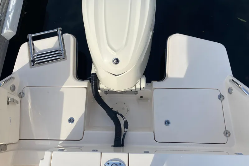  Yacht Photos Pics 2025 Grady-White Fisherman 236 boat stern with motor and swim platform.