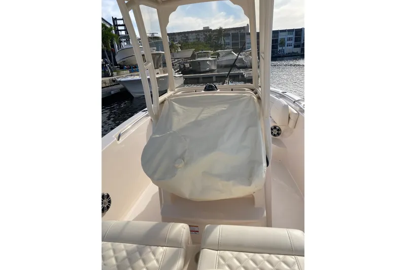  Yacht Photos Pics 2025 Grady-White Fisherman 236 boat interior with covered console at marina.