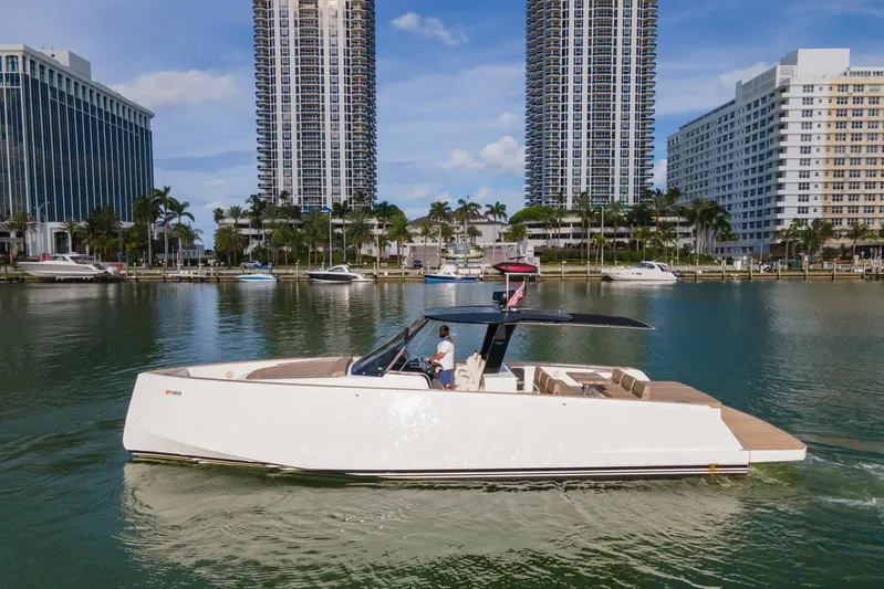 Darya One Yacht Photos Pics 2019 Pardo Yachts P43 cruising in urban waterfront setting with skyscrapers.