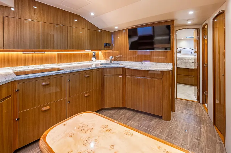 Mixer Yacht Photos Pics Luxurious 2015 Viking 52 yacht interior with modern kitchen and cozy bedroom.