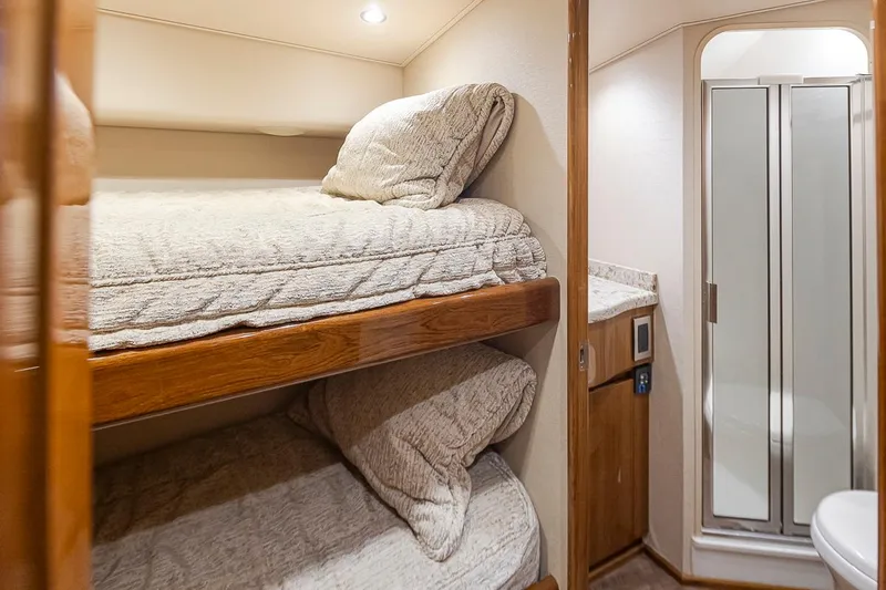 Mixer Yacht Photos Pics 2015 Viking 52 yacht interior with bunk beds and bathroom.