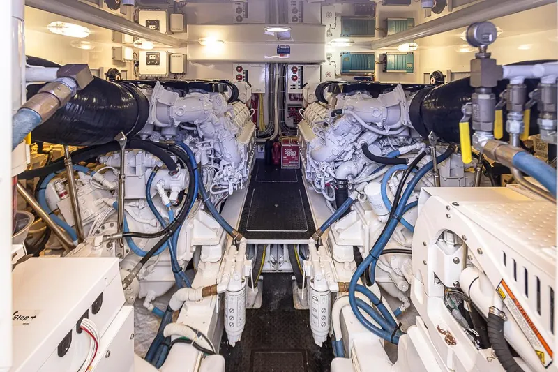 Mixer Yacht Photos Pics Engine room of a 2015 Viking 52 yacht with dual engines and complex machinery.