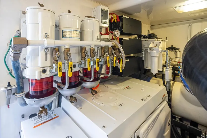 Mixer Yacht Photos Pics Engine room of a 2015 Viking 52 yacht with fuel filters and machinery.