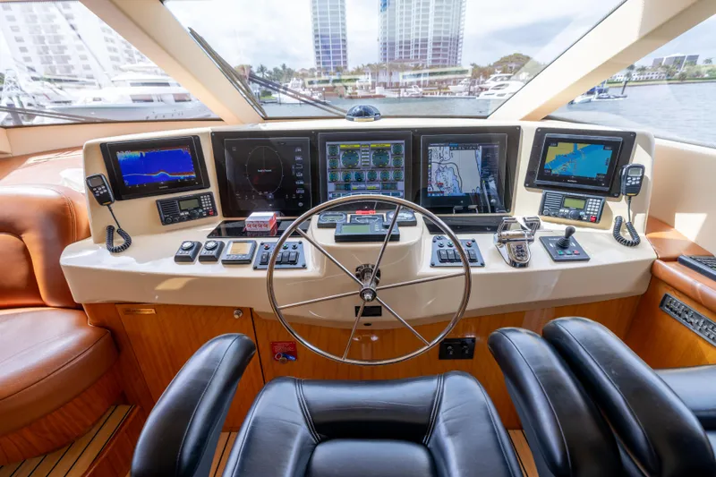 Outrageous Yacht Photos Pics Helm of 2005 Hatteras 80 Motor Yacht with advanced navigation systems and controls.