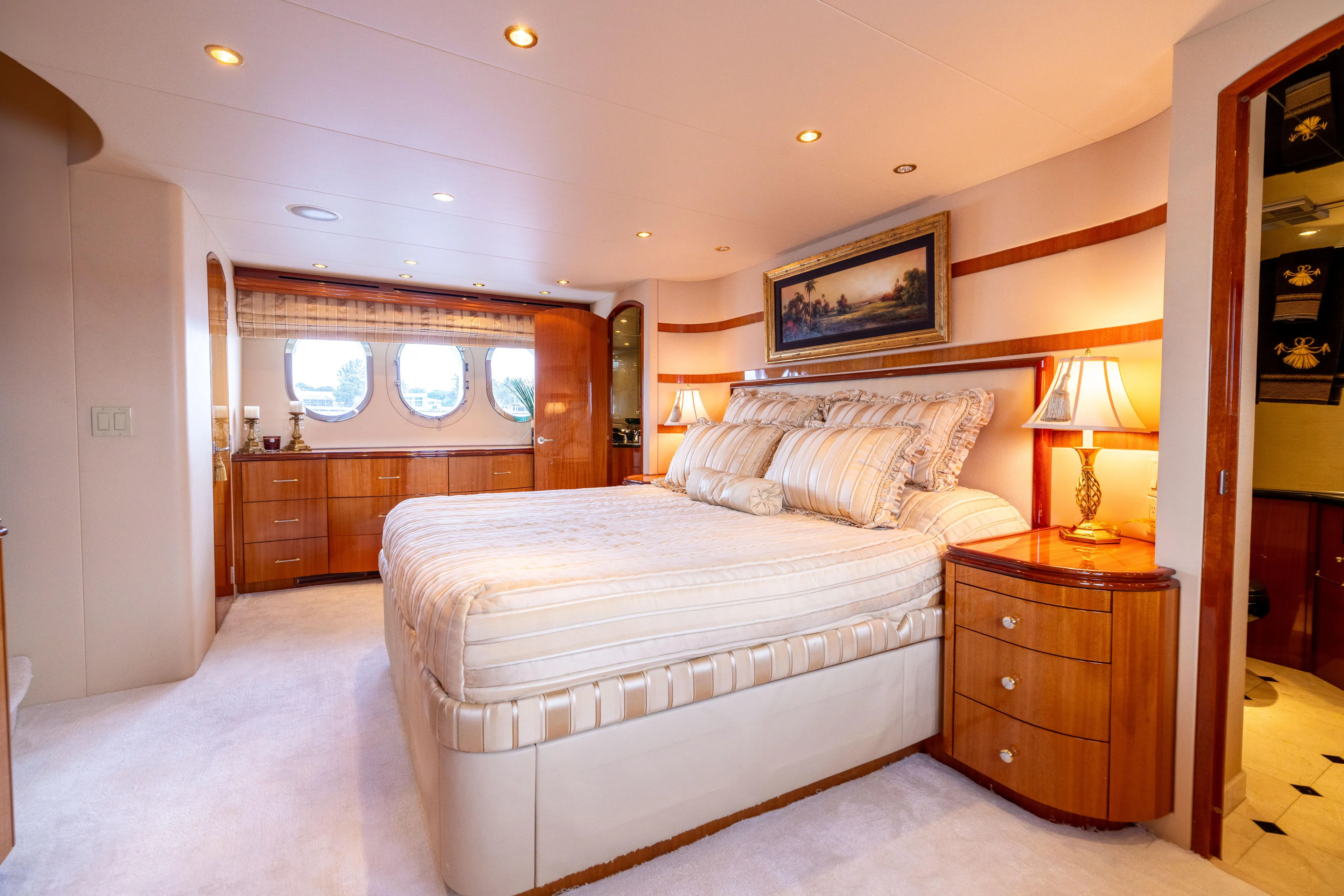 Outrageous Yacht Photos Pics Luxurious bedroom interior of 2005 Hatteras 80 Motor Yacht with elegant furnishings.