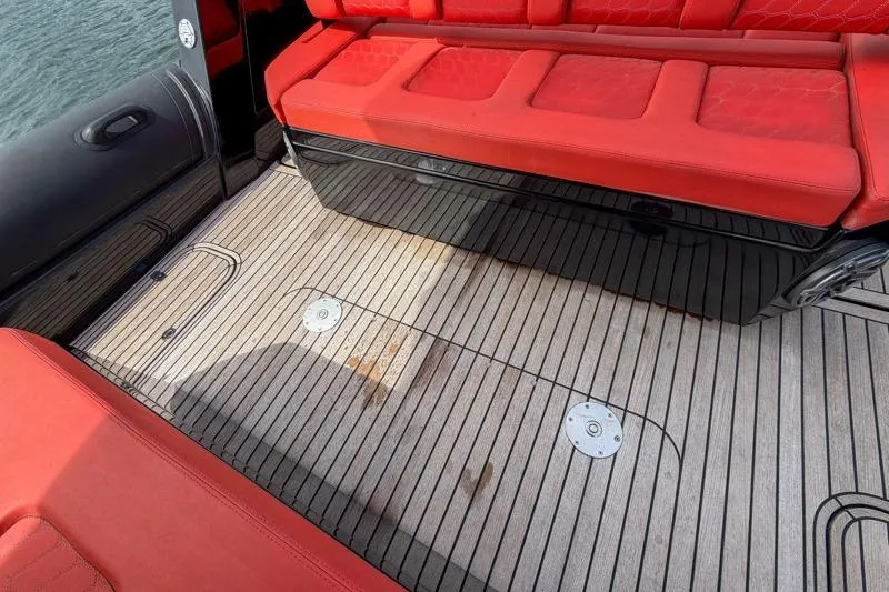  Yacht Photos Pics Red seating and teak deck on 2023 Skipper-BSK 42NC boat.