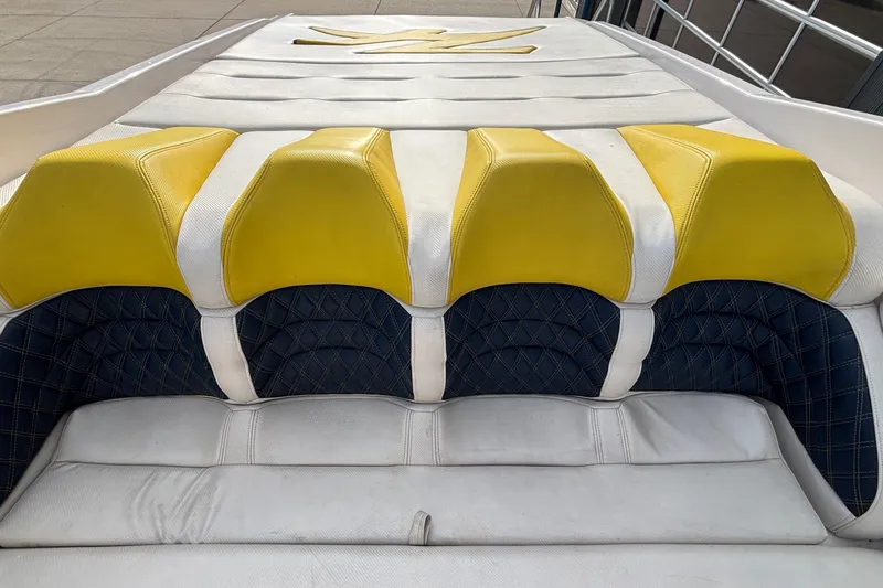  Yacht Photos Pics 2002 Donzi 45 ZX boat seating with yellow and white upholstery.