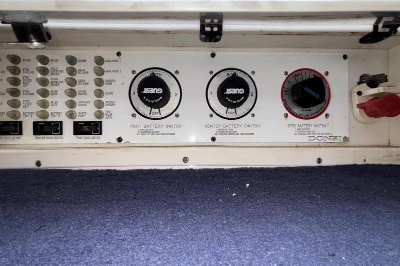  Yacht Photos Pics Control panel of a 2002 Donzi 45 ZX boat with battery switches and meters.