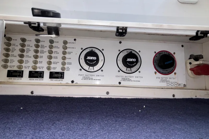  Yacht Photos Pics Control panel of a 2002 Donzi 45 ZX boat with battery switches and meters.