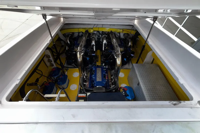  Yacht Photos Pics Engine compartment of a 2002 Donzi 45 ZX boat, showcasing powerful machinery.