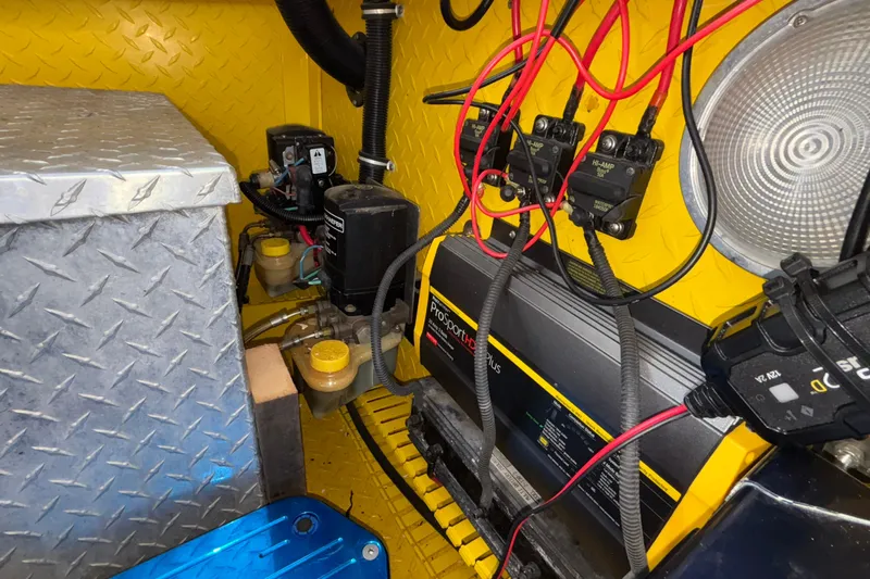  Yacht Photos Pics Engine compartment of a 2002 Donzi 45 ZX boat with wiring and components.