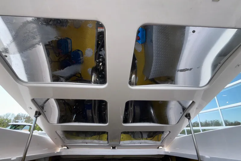  Yacht Photos Pics Engine compartment of a 2002 Donzi 45 ZX boat with reflective panels.