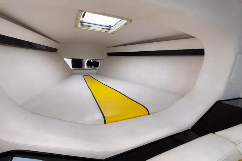  Yacht Photos Pics Interior cabin of 2002 Donzi 45 ZX boat with white and yellow accents.