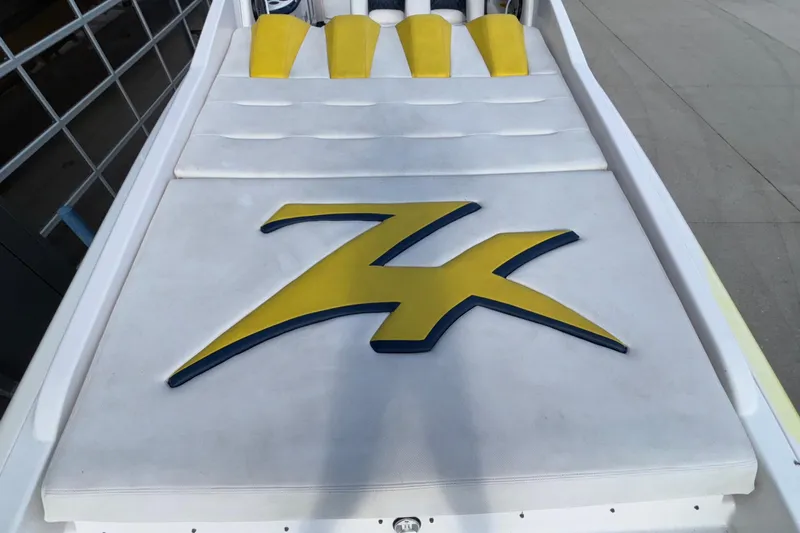  Yacht Photos Pics 2002 Donzi 45 ZX boat deck with yellow and blue logo design.