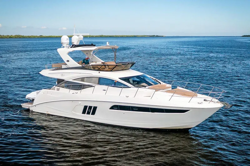 Aequa 1 Yacht Photos Pics 2016 Sea Ray L590 Fly yacht cruising on open water.