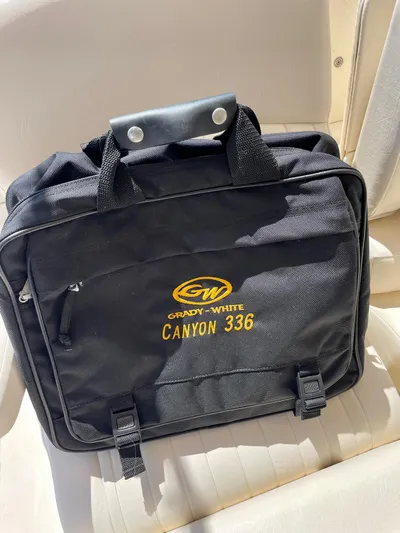  Yacht Photos Pics Black Grady-White Canyon 336 bag on boat seat, 2012 model.