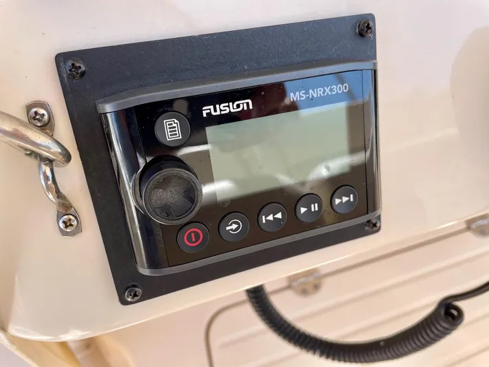  Yacht Photos Pics Fusion MS-NRX300 marine stereo on 2012 Grady-White Canyon 336 boat dashboard.