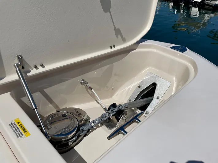  Yacht Photos Pics 2012 Grady-White Canyon 336 anchor compartment with chain and winch mechanism.