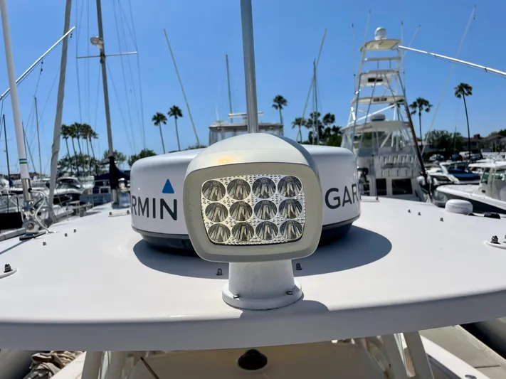  Yacht Photos Pics 2012 Grady-White Canyon 336 boat with Garmin radar and LED light, docked in marina.
