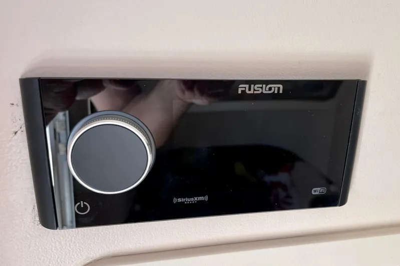  Yacht Photos Pics Fusion stereo system on 2012 Grady-White Canyon 336 boat dashboard.