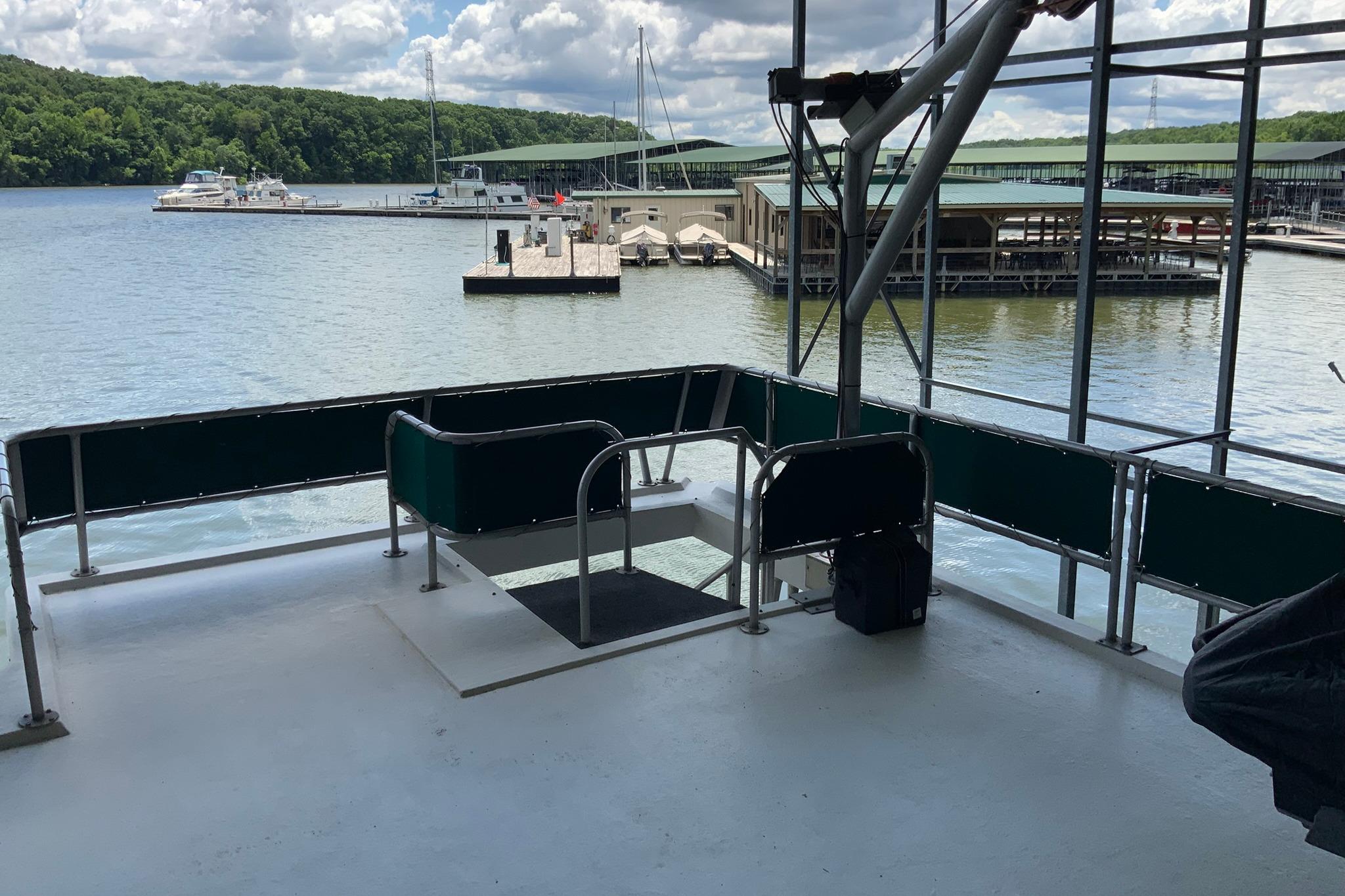 Houseboat deck overlooking marina and lake, Lakeview 16 x 65, 1997 model.
