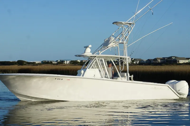  Yacht Photos Pics 2017 SeaHunter 35 Tournament boat cruising on calm water, clear sky background.