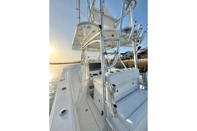  Yacht Photos Pics 2017 SeaHunter 35 Tournament boat, sleek design, sunrise on calm water.