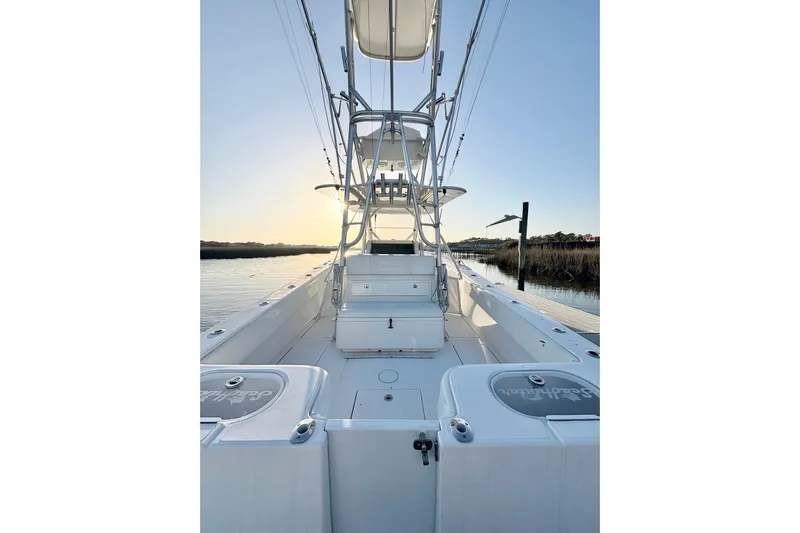  Yacht Photos Pics 2017 SeaHunter 35 Tournament boat on calm water at sunset.