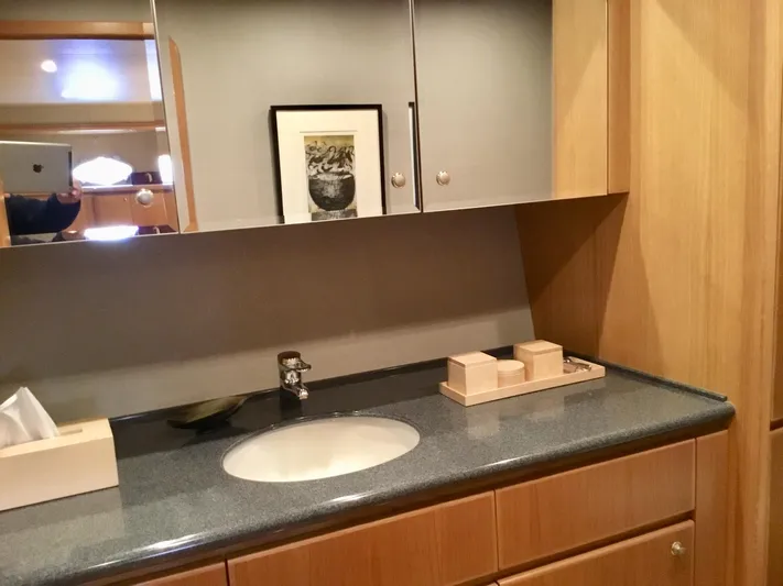 "southern Cross" Yacht Photos Pics Luxurious bathroom interior of 1998 West Bay Sonship yacht with modern fixtures.