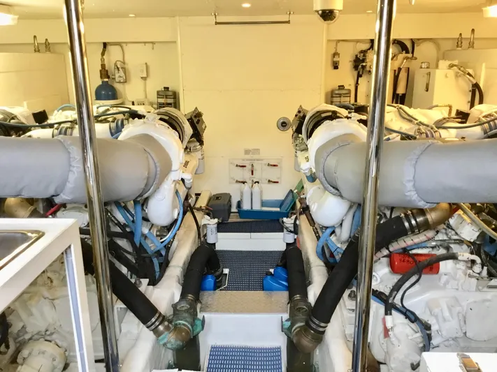 "southern Cross" Yacht Photos Pics Engine room of 1998 West Bay Sonship yacht, featuring dual engines and mechanical components.