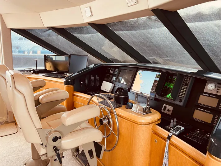 "southern Cross" Yacht Photos Pics 1998 West Bay Sonship yacht helm with modern navigation equipment and luxurious seating.