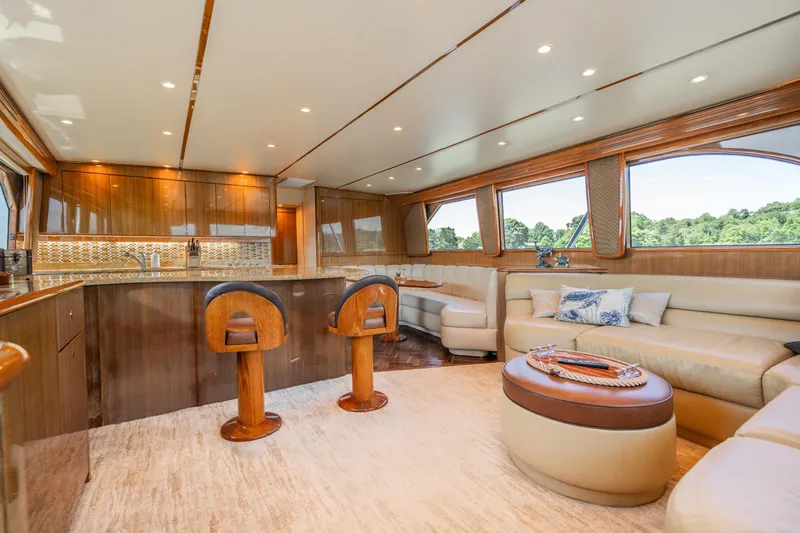 Second Generation Yacht Photos Pics Luxurious interior of 2006 Viking 68 Convertible yacht with elegant seating and modern kitchen.