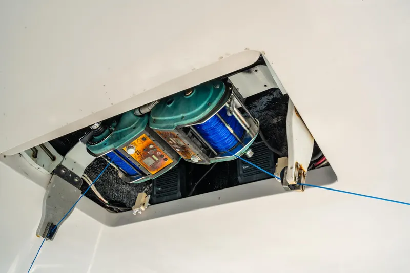 Second Generation Yacht Photos Pics Fishing reel mechanism on a 2006 Viking 68 Convertible yacht ceiling.