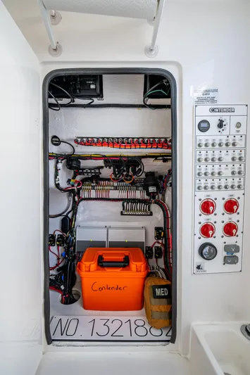 Wunderbar Yacht Photos Pics Electrical panel and wiring inside a 2022 Contender 39 ST boat.