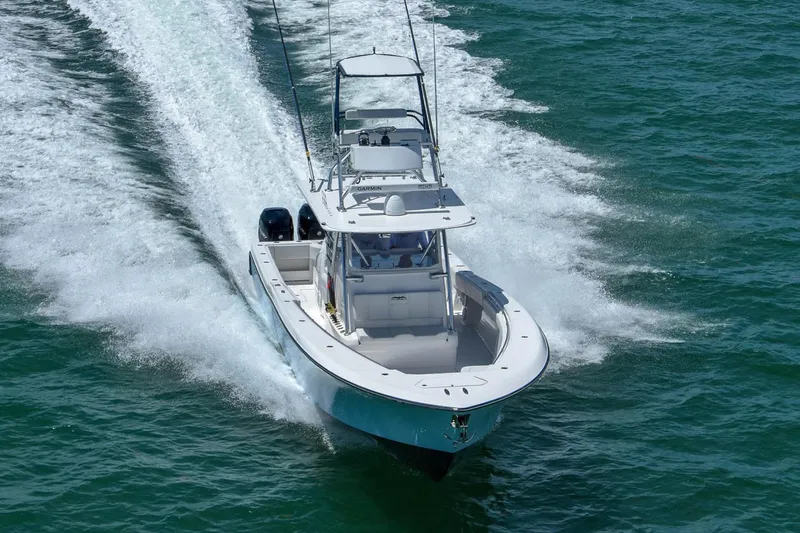  Yacht Photos Pics Manufacturer Provided Image: 2022 Invincible 42 Open Fisherman boat cruising on the water.