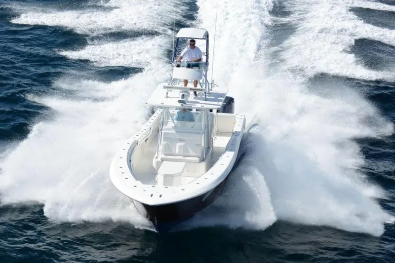  Yacht Photos Pics Manufacturer Provided Image: 2022 Invincible 42 Open Fisherman speeding on the water.