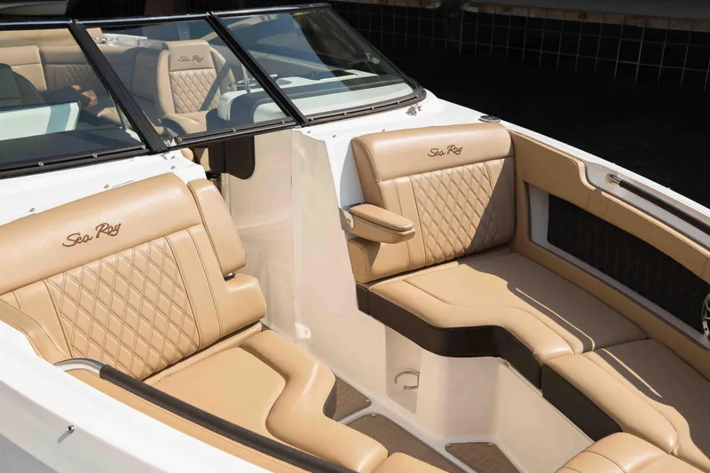  Yacht Photos Pics Luxurious interior of 2019 Sea Ray SLX 280 boat with tan leather seating.