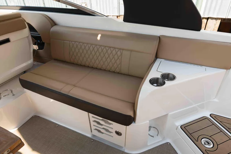  Yacht Photos Pics 2019 Sea Ray SLX 280 interior with tan seating and cup holders.