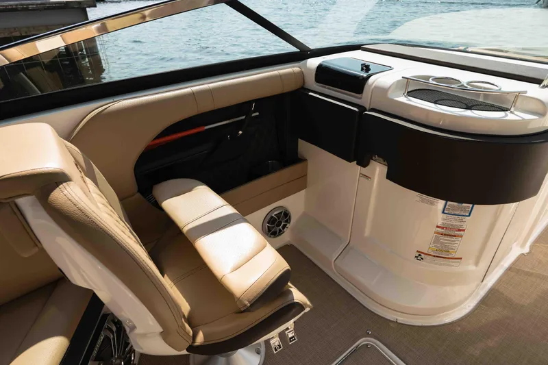  Yacht Photos Pics 2019 Sea Ray SLX 280 boat interior with beige seating and control panel.