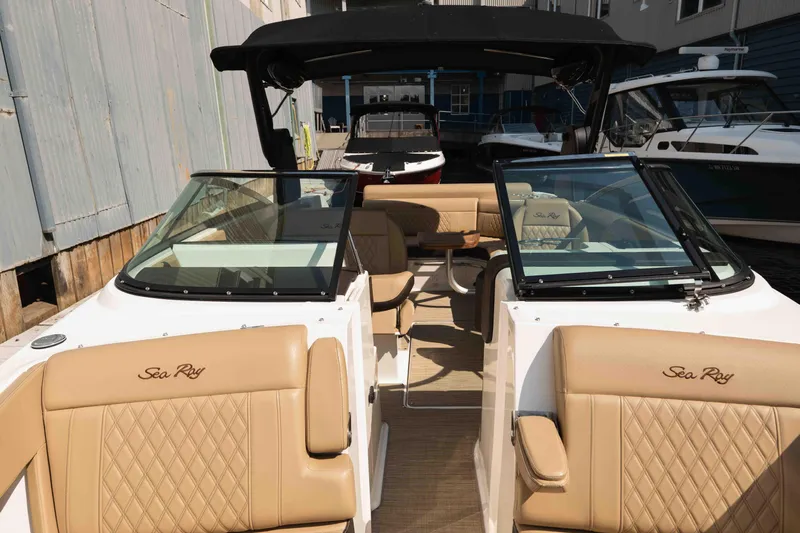  Yacht Photos Pics 2019 Sea Ray SLX 280 boat interior with tan leather seating and open cockpit.
