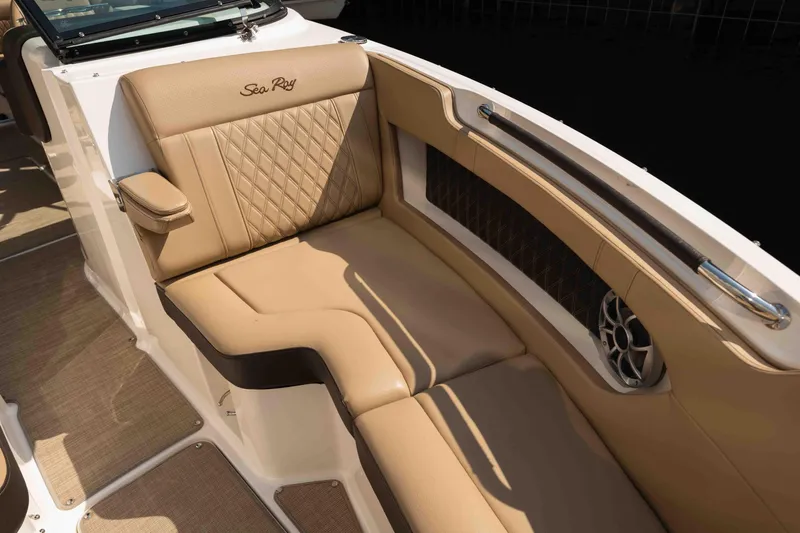  Yacht Photos Pics Luxurious tan seating on 2019 Sea Ray SLX 280 boat, featuring elegant design and comfort.