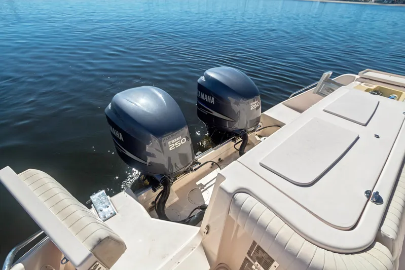 Pole Position Yacht Photos Pics 2006 Grady-White Express 330 boat with twin Yamaha 250 outboard engines on calm water.