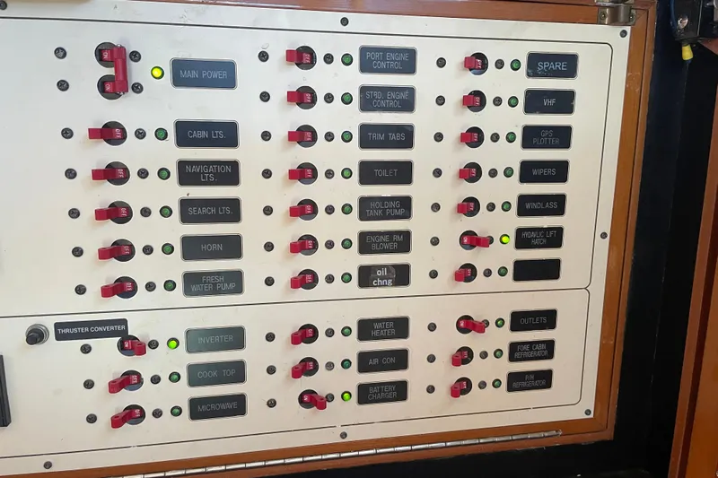  Yacht Photos Pics Control panel of a 2006 Marlow 375 Prowler Classic boat with labeled switches.
