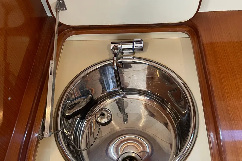  Yacht Photos Pics Stainless steel sink in 2006 Marlow 375 Prowler Classic boat interior.