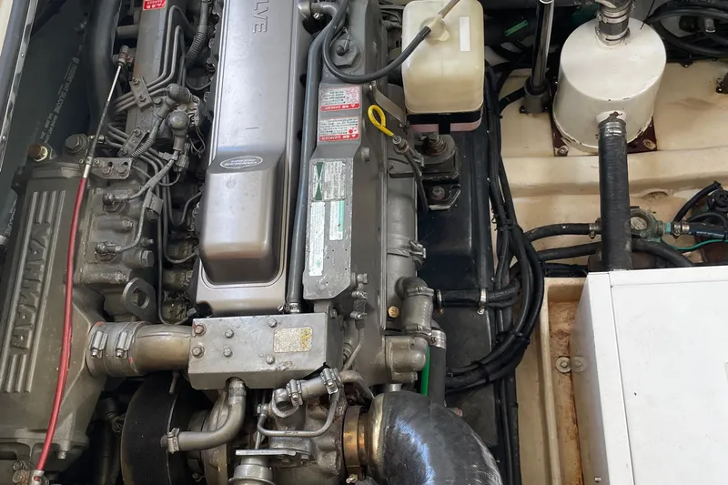  Yacht Photos Pics Engine compartment of a 2006 Marlow 375 Prowler Classic boat, showcasing mechanical components.